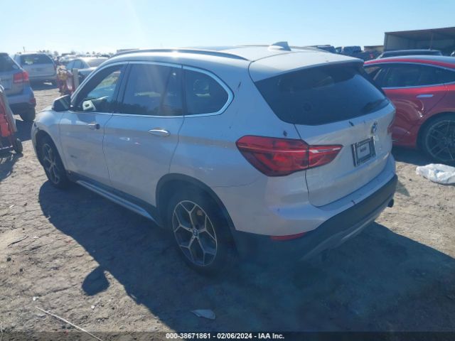 Photo 2 VIN: WBXHT3C30H5F77214 - BMW X1 