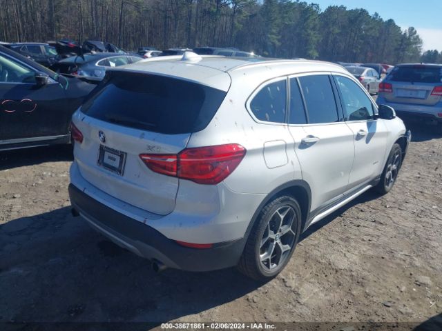 Photo 3 VIN: WBXHT3C30H5F77214 - BMW X1 