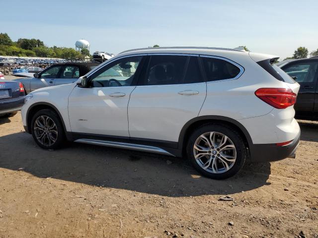 Photo 1 VIN: WBXHT3C30H5F79951 - BMW X1 XDRIVE2 