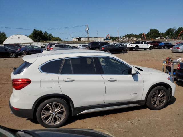 Photo 2 VIN: WBXHT3C30H5F79951 - BMW X1 XDRIVE2 