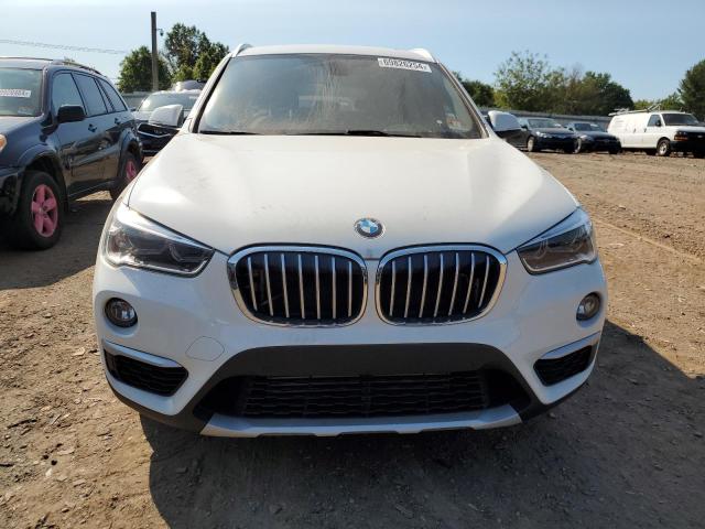 Photo 4 VIN: WBXHT3C30H5F79951 - BMW X1 XDRIVE2 