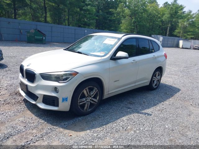 Photo 1 VIN: WBXHT3C30H5F83496 - BMW X1 