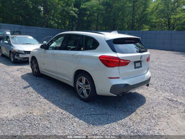 Photo 2 VIN: WBXHT3C30H5F83496 - BMW X1 