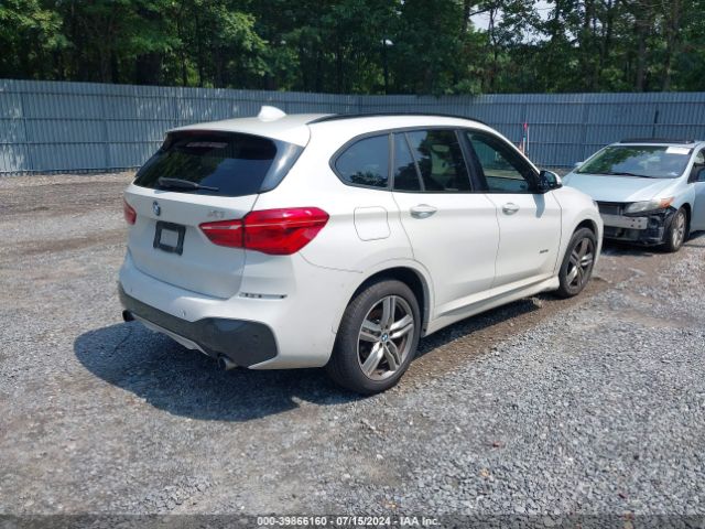 Photo 3 VIN: WBXHT3C30H5F83496 - BMW X1 