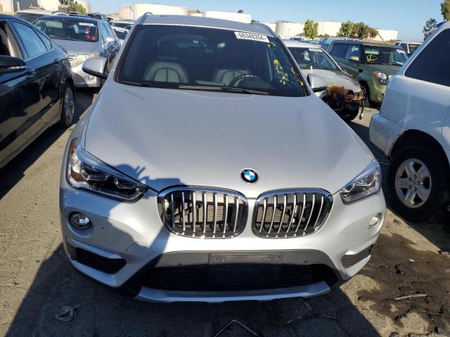 Photo 4 VIN: WBXHT3C30H5F84468 - BMW X1 