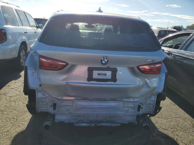 Photo 5 VIN: WBXHT3C30H5F84468 - BMW X1 