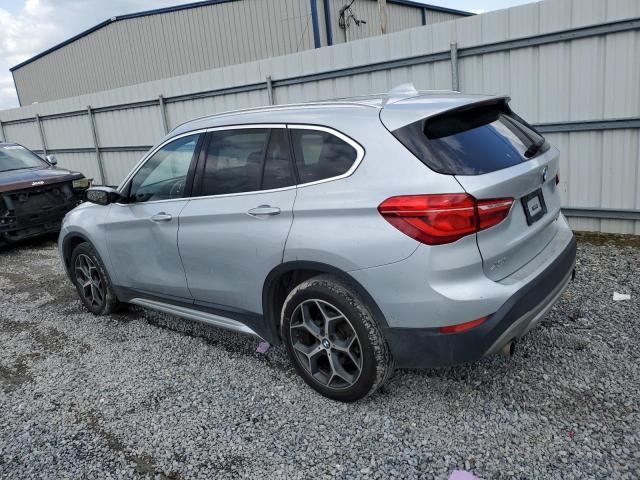 Photo 1 VIN: WBXHT3C30J3H31860 - BMW X1 