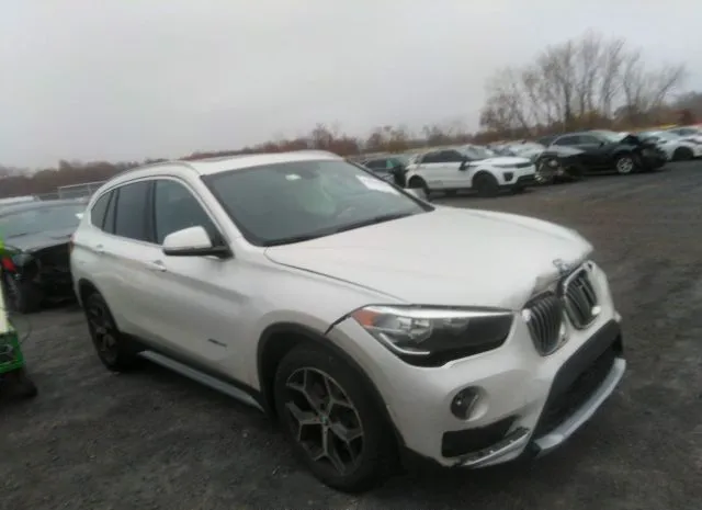 Photo 0 VIN: WBXHT3C30J5F89465 - BMW X1 