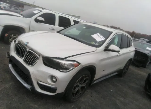 Photo 1 VIN: WBXHT3C30J5F89465 - BMW X1 