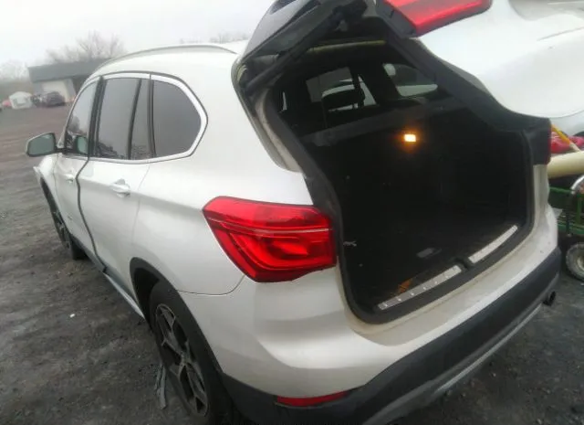 Photo 2 VIN: WBXHT3C30J5F89465 - BMW X1 