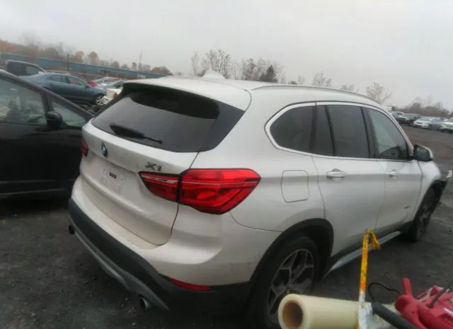 Photo 3 VIN: WBXHT3C30J5F89465 - BMW X1 