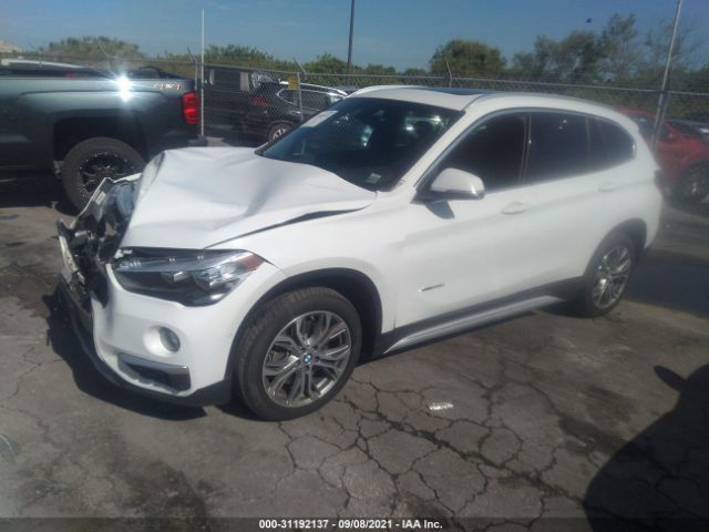 Photo 1 VIN: WBXHT3C30J5F90440 - BMW X1 