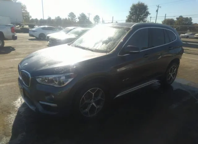 Photo 1 VIN: WBXHT3C30J5F91152 - BMW X1 