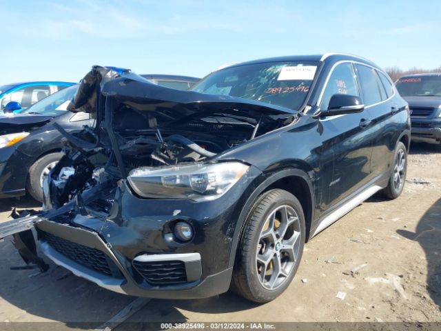 Photo 1 VIN: WBXHT3C30J5F91961 - BMW X1 