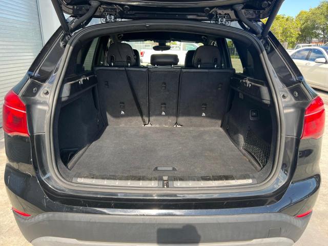 Photo 12 VIN: WBXHT3C30J5K24636 - BMW X1 