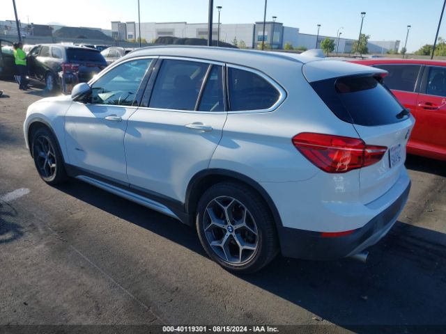 Photo 2 VIN: WBXHT3C30J5K31473 - BMW X1 