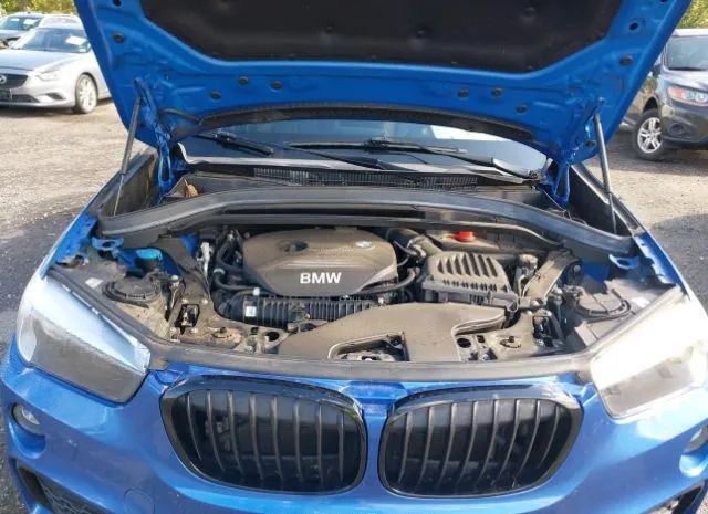 Photo 9 VIN: WBXHT3C30J5L24476 - BMW X1 