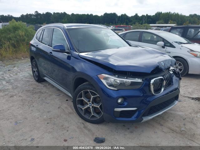 Photo 0 VIN: WBXHT3C30J5L32335 - BMW X1 