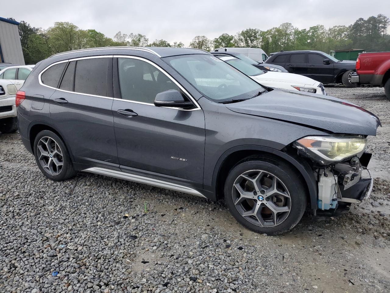 Photo 3 VIN: WBXHT3C31G5E47120 - BMW X1 