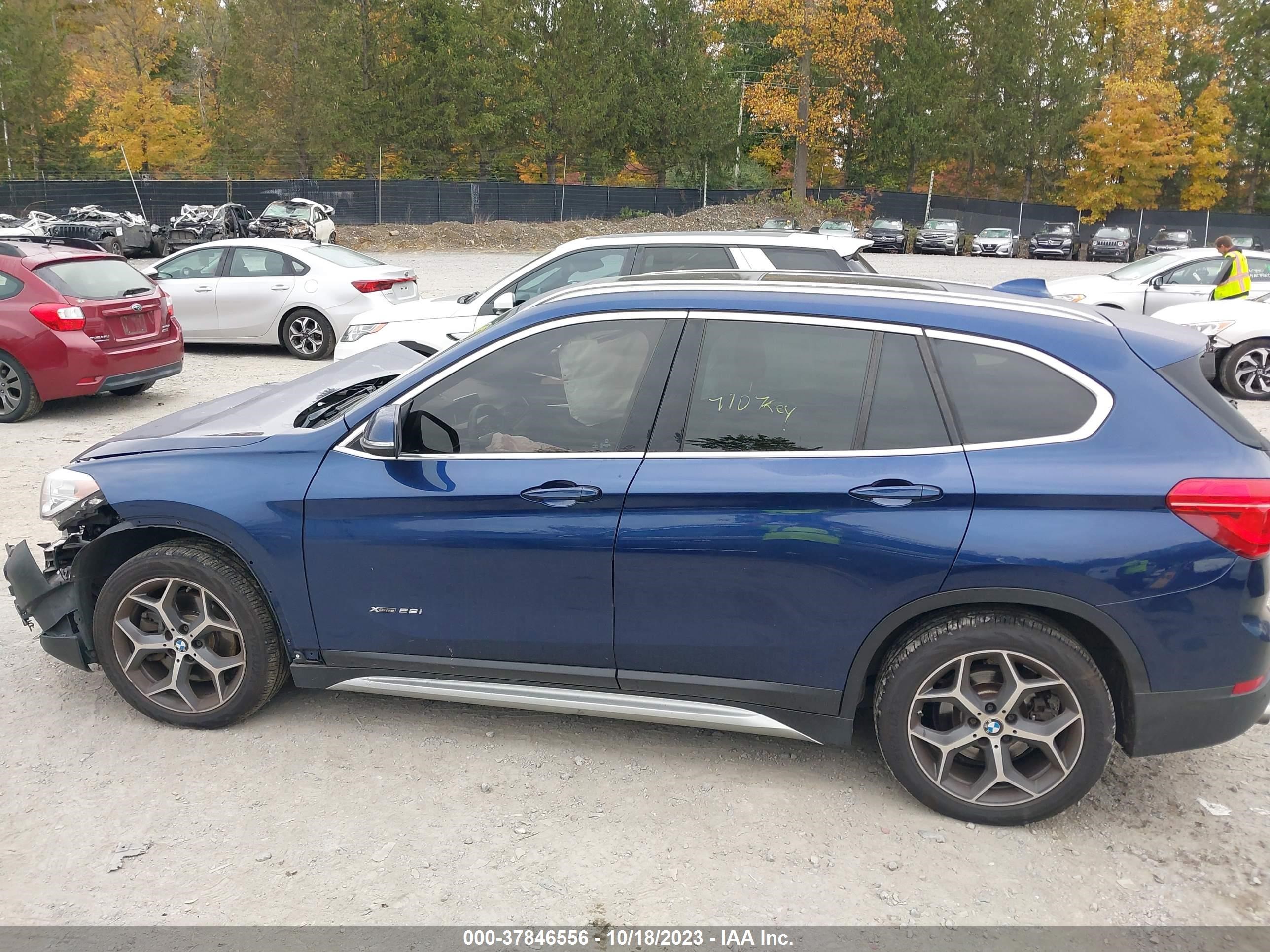 Photo 12 VIN: WBXHT3C31G5E47778 - BMW X1 