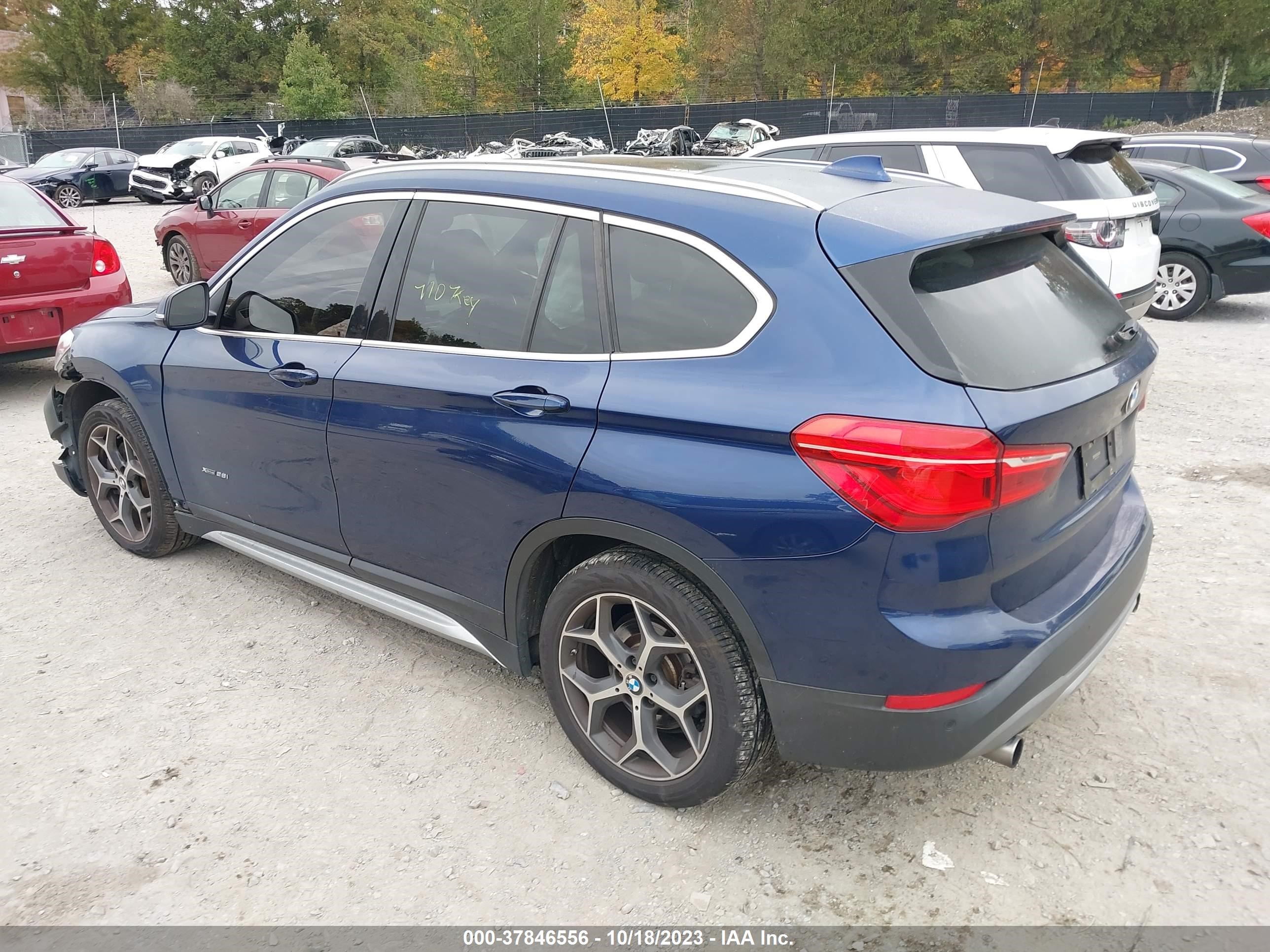 Photo 2 VIN: WBXHT3C31G5E47778 - BMW X1 