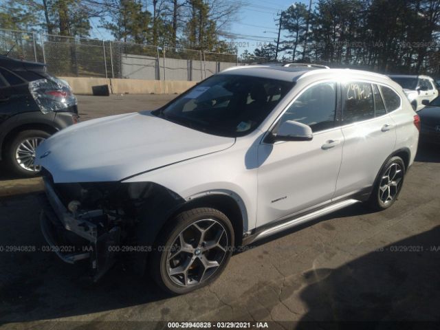 Photo 1 VIN: WBXHT3C31G5E50924 - BMW X1 