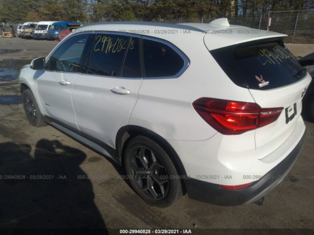 Photo 2 VIN: WBXHT3C31G5E50924 - BMW X1 