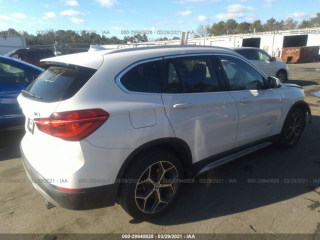 Photo 3 VIN: WBXHT3C31G5E50924 - BMW X1 