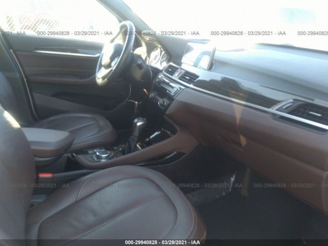 Photo 4 VIN: WBXHT3C31G5E50924 - BMW X1 