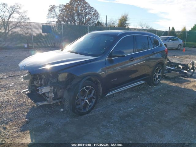 Photo 1 VIN: WBXHT3C31G5E54116 - BMW X1 