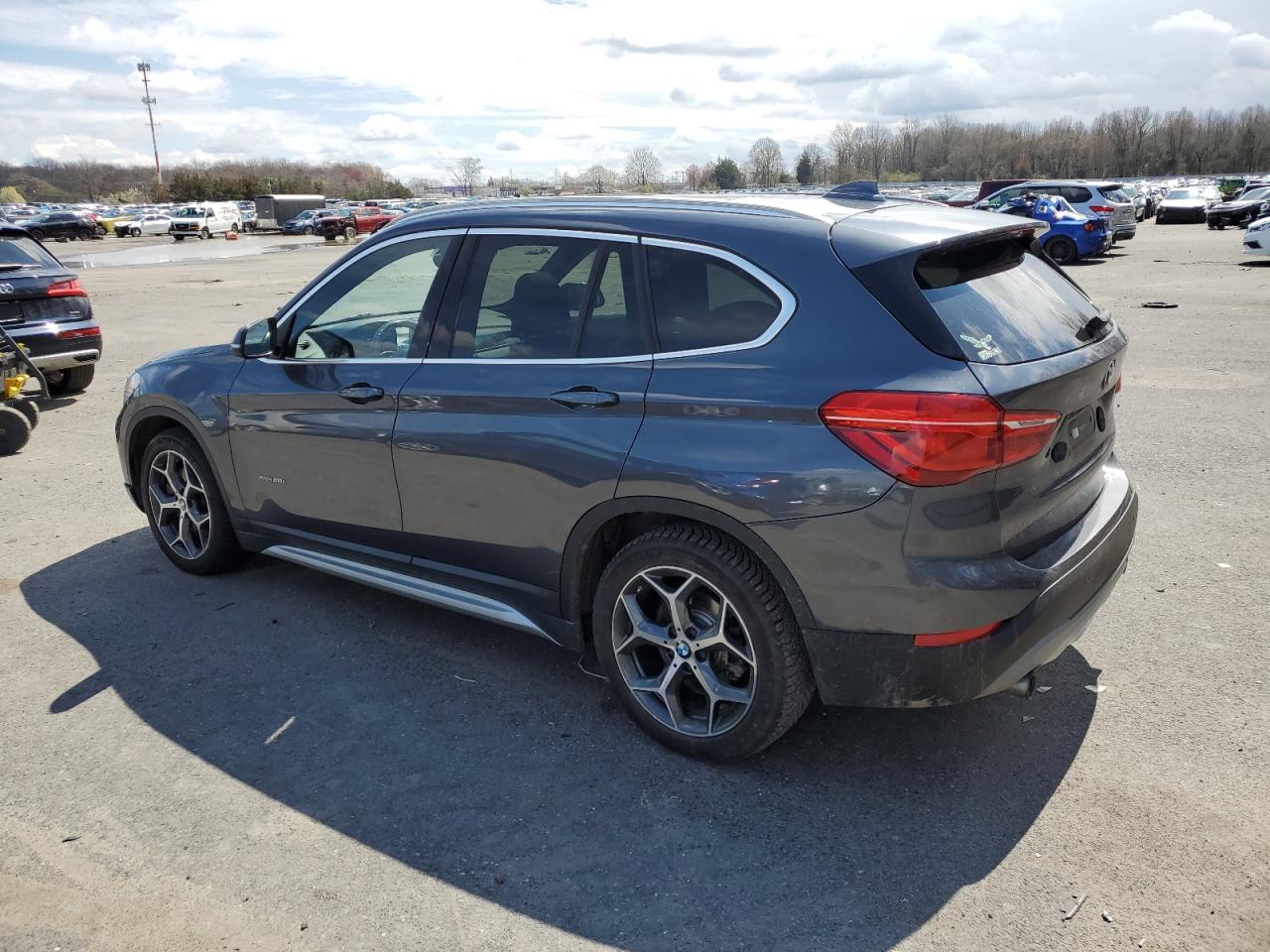 Photo 1 VIN: WBXHT3C31G5E54780 - BMW X1 