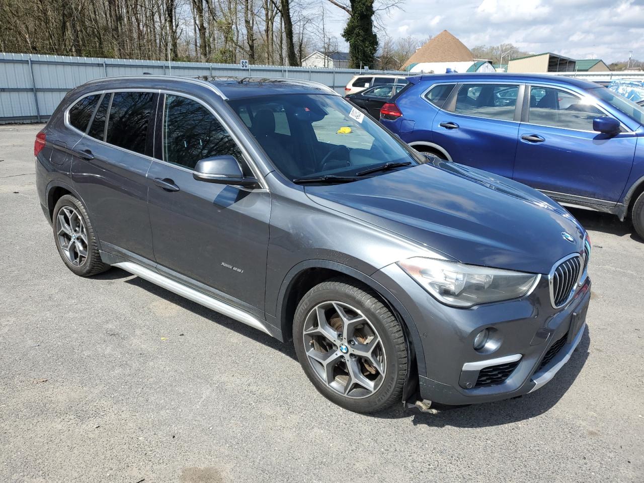 Photo 3 VIN: WBXHT3C31G5E54780 - BMW X1 