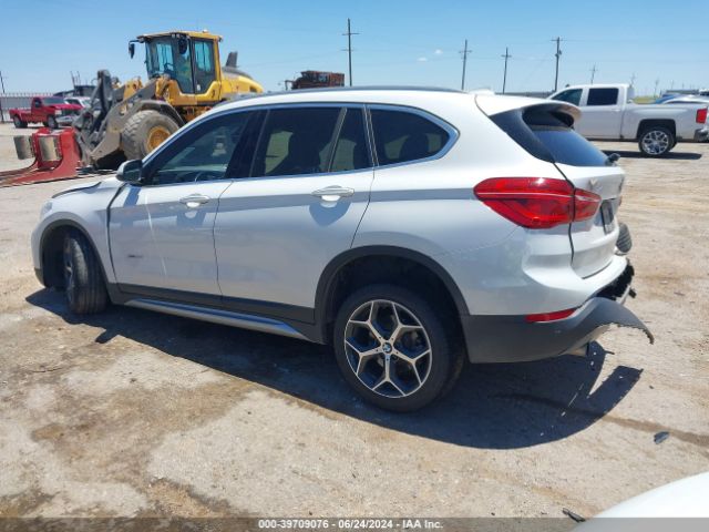 Photo 2 VIN: WBXHT3C31G5F64518 - BMW X1 