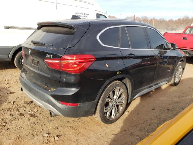 Photo 2 VIN: WBXHT3C31G5F67385 - BMW X1 