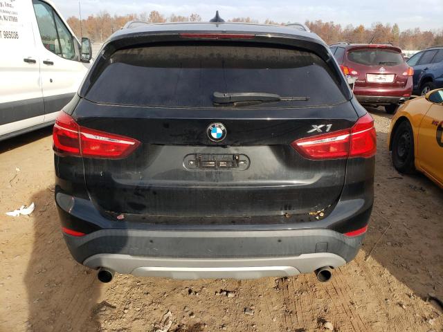 Photo 5 VIN: WBXHT3C31G5F67385 - BMW X1 