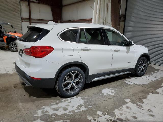 Photo 2 VIN: WBXHT3C31GP884651 - BMW X1 