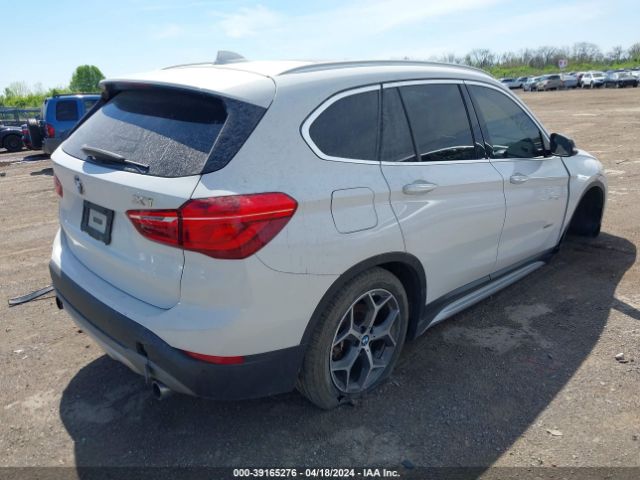 Photo 3 VIN: WBXHT3C31GP889333 - BMW X1 