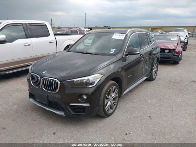 Photo 1 VIN: WBXHT3C31GP889395 - BMW X1 