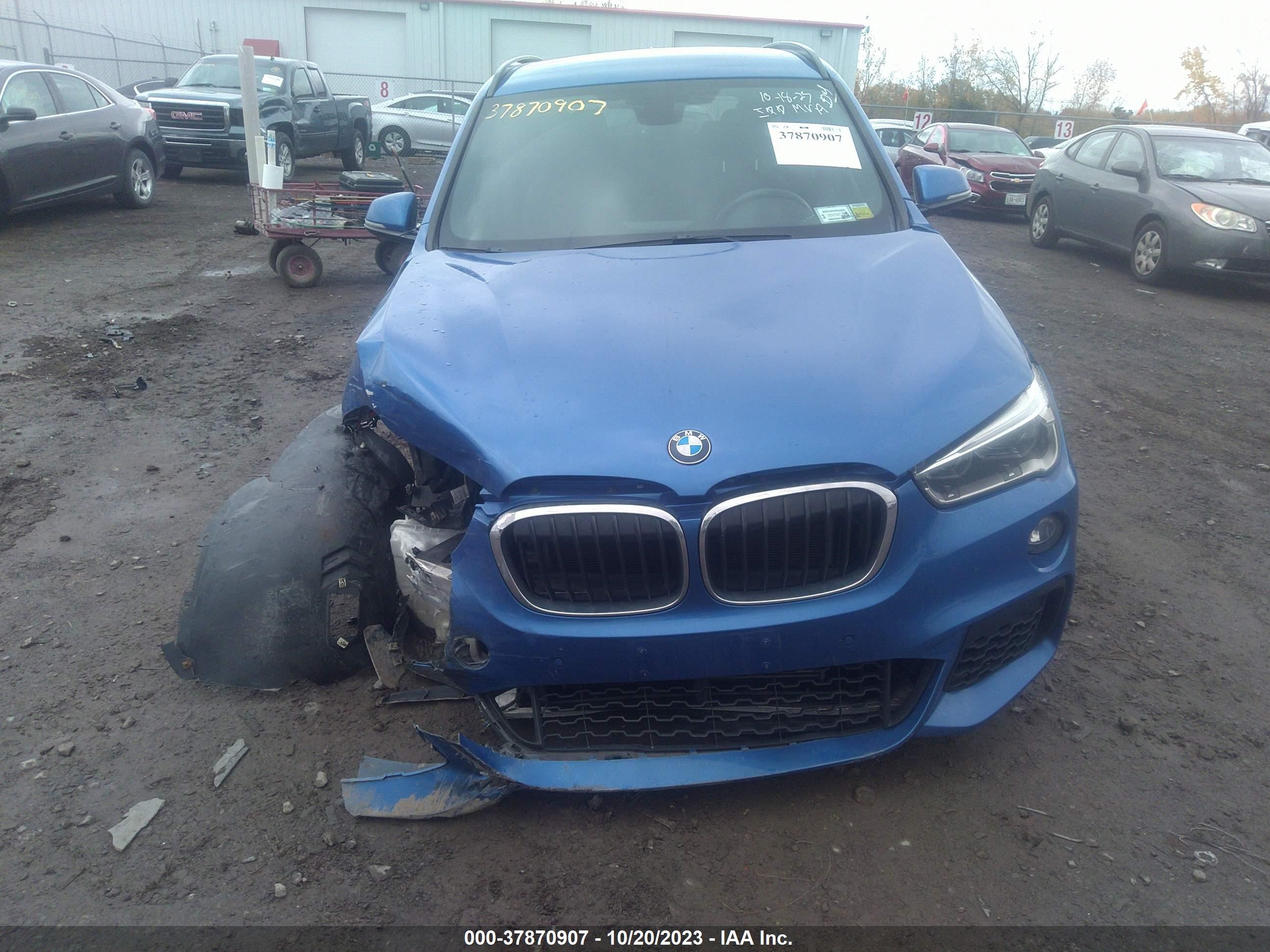 Photo 11 VIN: WBXHT3C31H5F71034 - BMW X1 