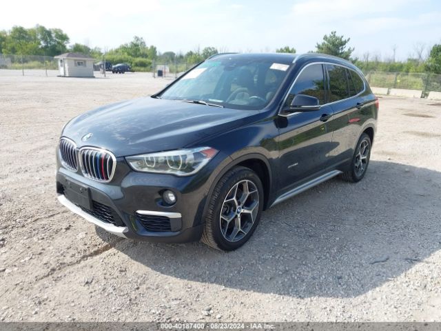 Photo 1 VIN: WBXHT3C31H5F74743 - BMW X1 