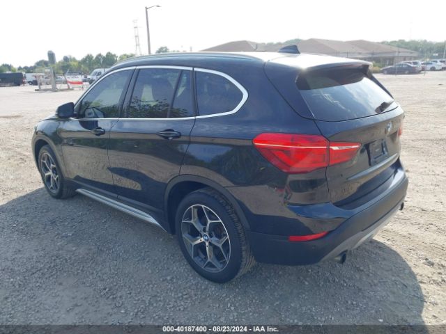 Photo 2 VIN: WBXHT3C31H5F74743 - BMW X1 