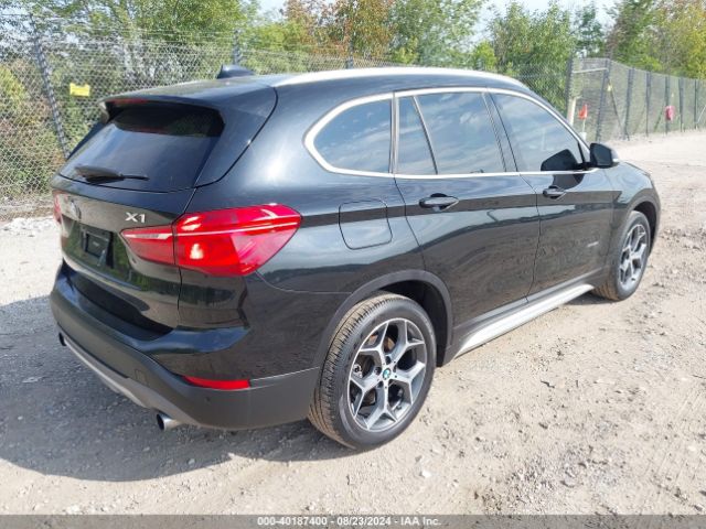 Photo 3 VIN: WBXHT3C31H5F74743 - BMW X1 