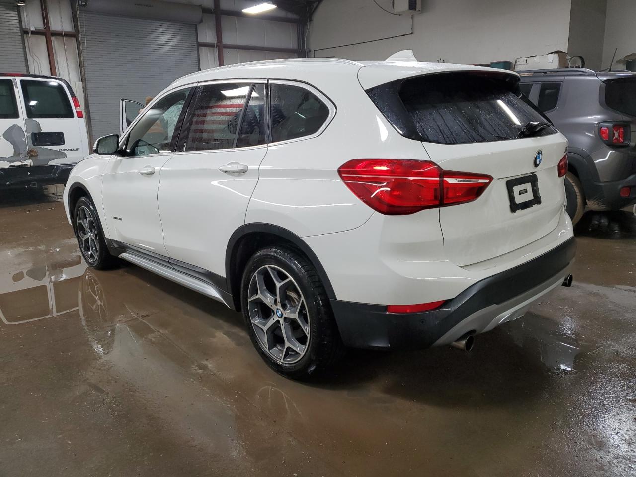 Photo 1 VIN: WBXHT3C31H5F76458 - BMW X1 