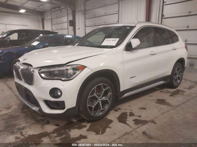 Photo 1 VIN: WBXHT3C31H5F76458 - BMW X1 