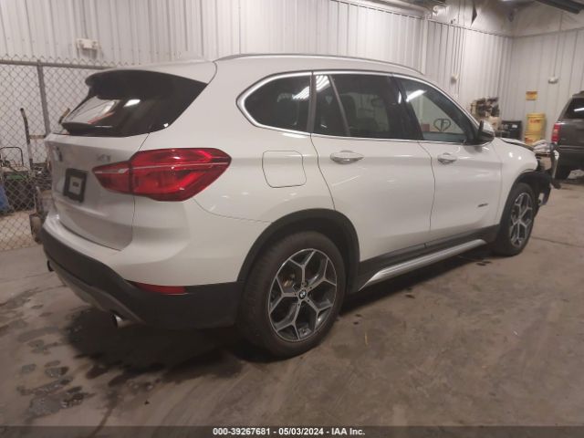 Photo 3 VIN: WBXHT3C31H5F76458 - BMW X1 