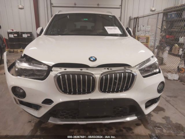 Photo 5 VIN: WBXHT3C31H5F76458 - BMW X1 