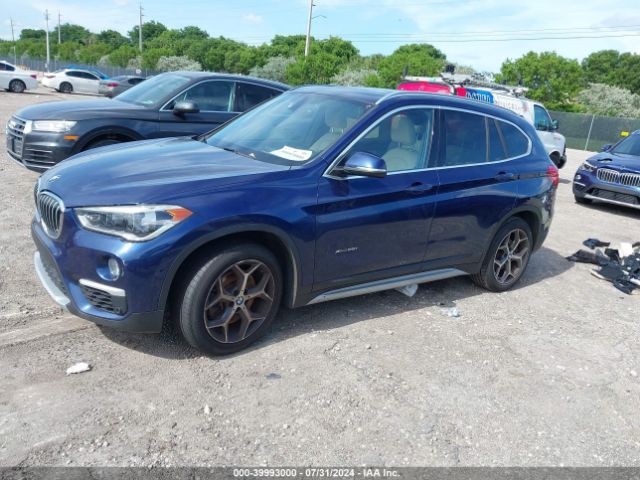 Photo 1 VIN: WBXHT3C31H5F82633 - BMW X1 