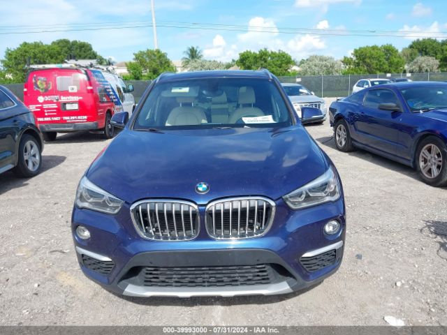 Photo 5 VIN: WBXHT3C31H5F82633 - BMW X1 