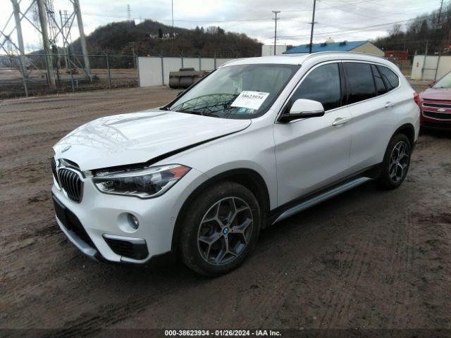 Photo 1 VIN: WBXHT3C31J3H30619 - BMW X1 