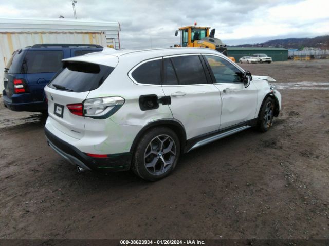 Photo 3 VIN: WBXHT3C31J3H30619 - BMW X1 